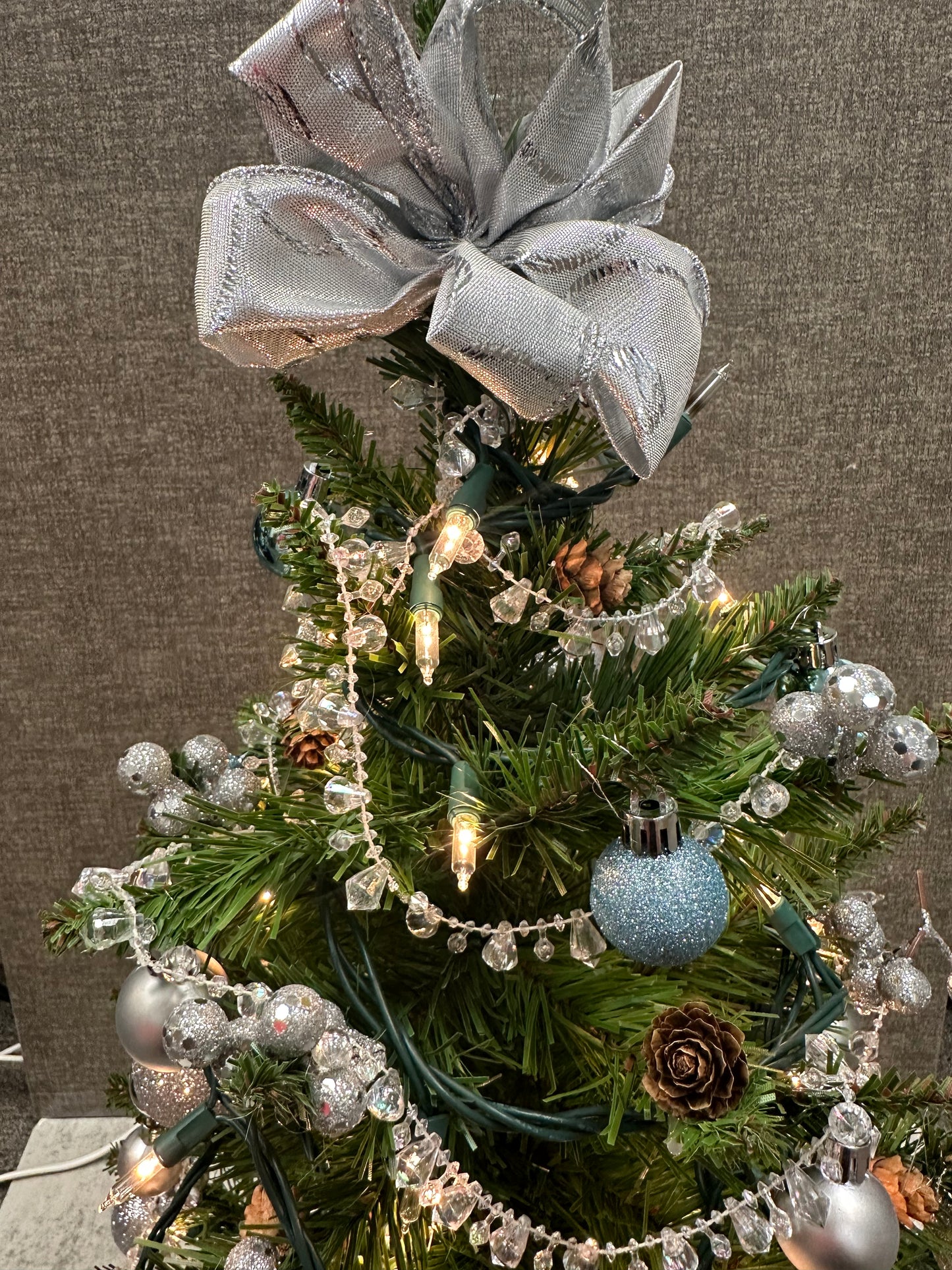 24” Mini Lighted Christmas Tree with silver accents, pinecones, and blue/silver ornaments-made by hand